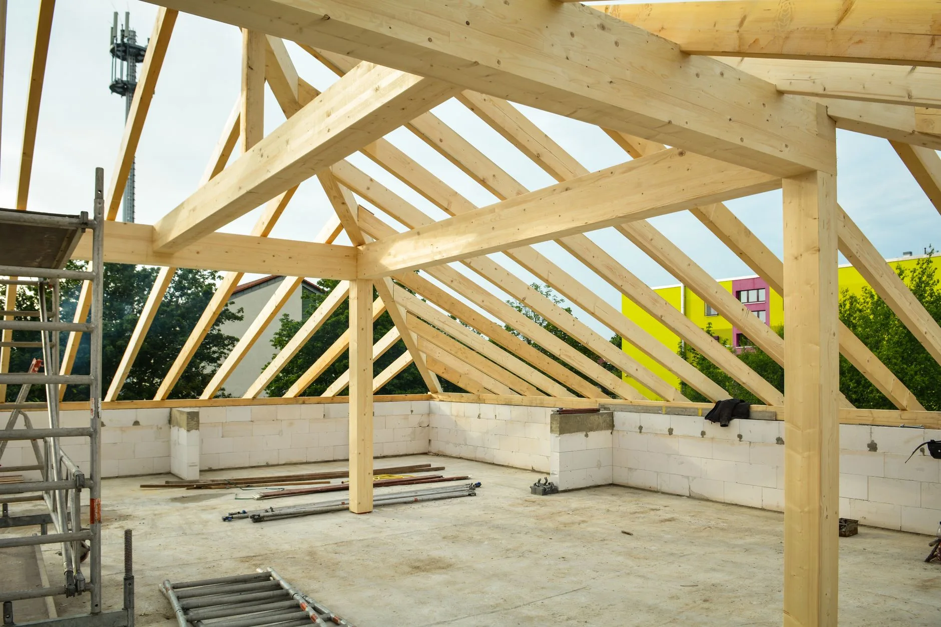 Ossature bois d'une maison en construction, levier de réduction de l'Ic construction